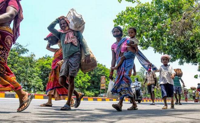 Indian workers walking to find an alternative livelihood Indian workers walking to find an alternative livelihood