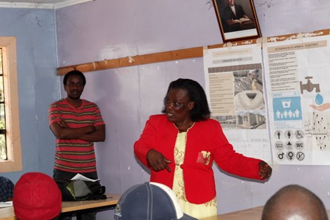 Anastacia Wairimu leading community discussions in Mukuru