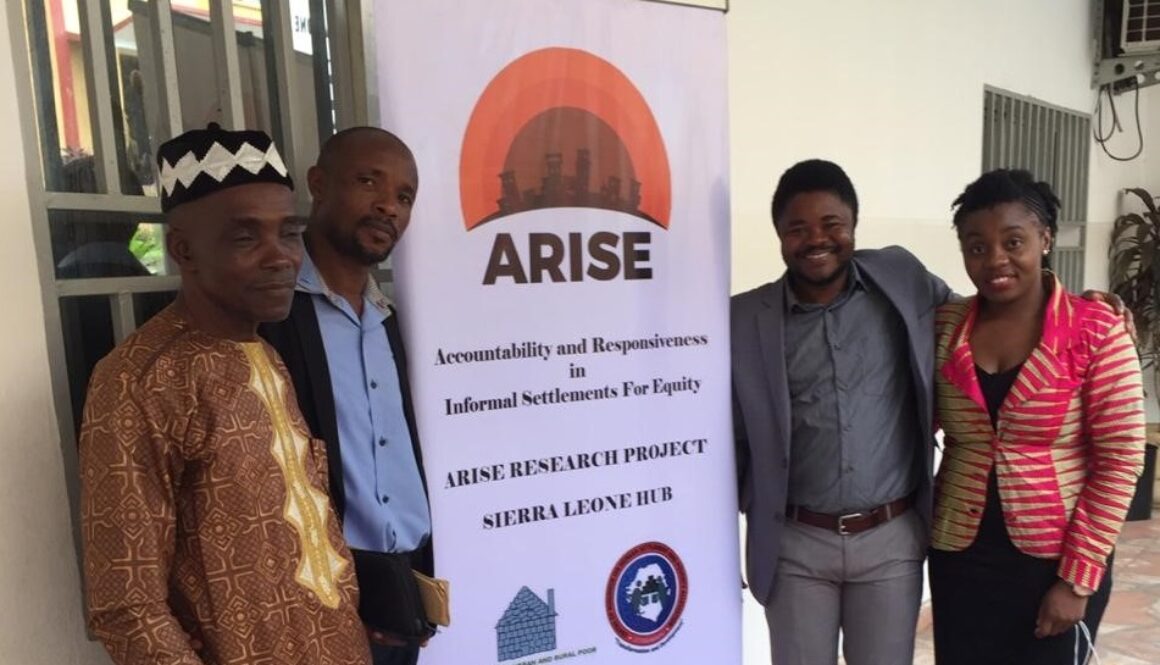 Sierra Leone team and a community elder at their launch