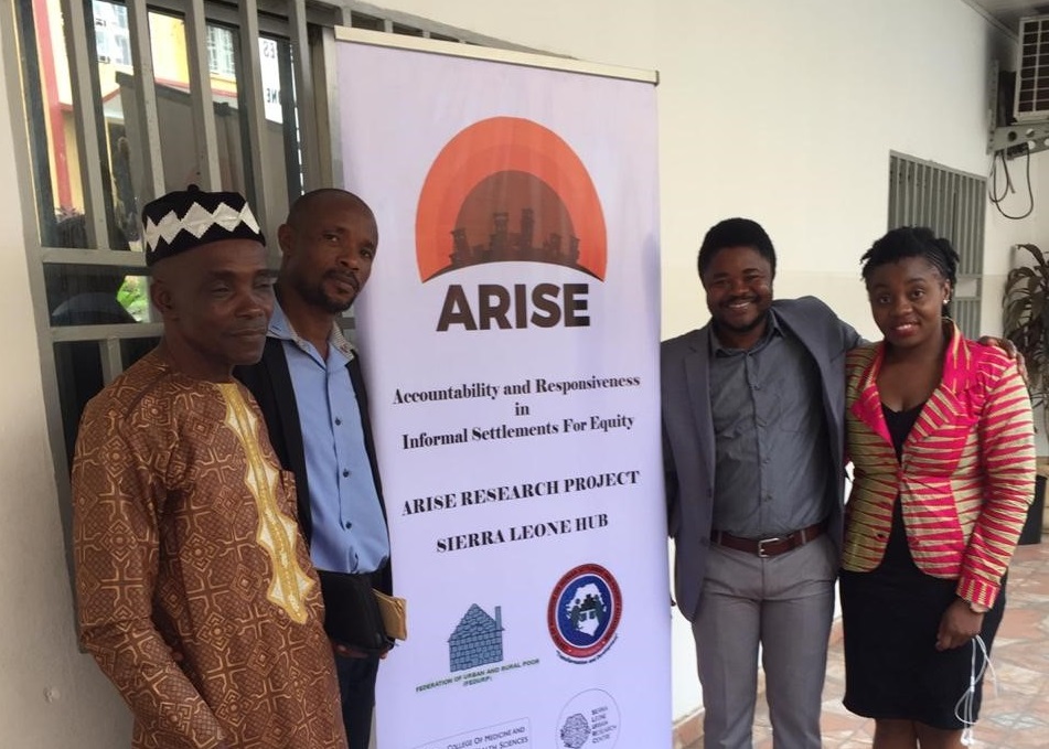 Sierra Leone team and a community elder at their launch