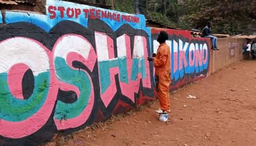 A colourful mural advocating for an end to teenage pregnancy