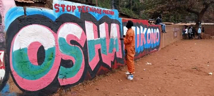 A colourful mural advocating for an end to teenage pregnancy