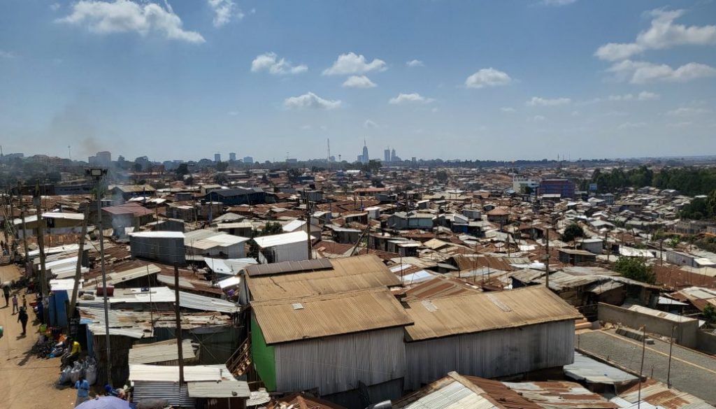 Is housing still a major issue in slums?