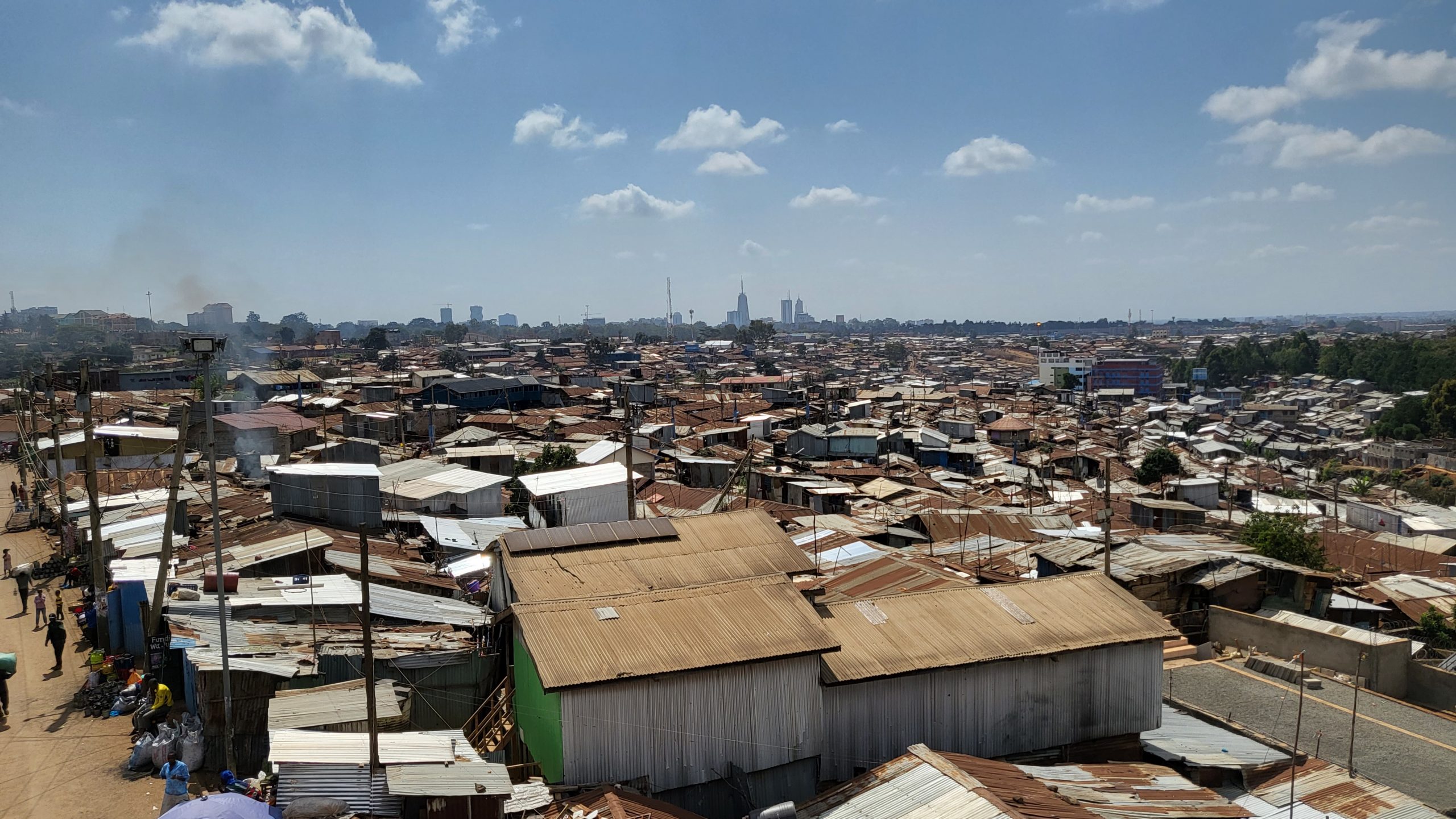 Is housing still a major issue in slums?